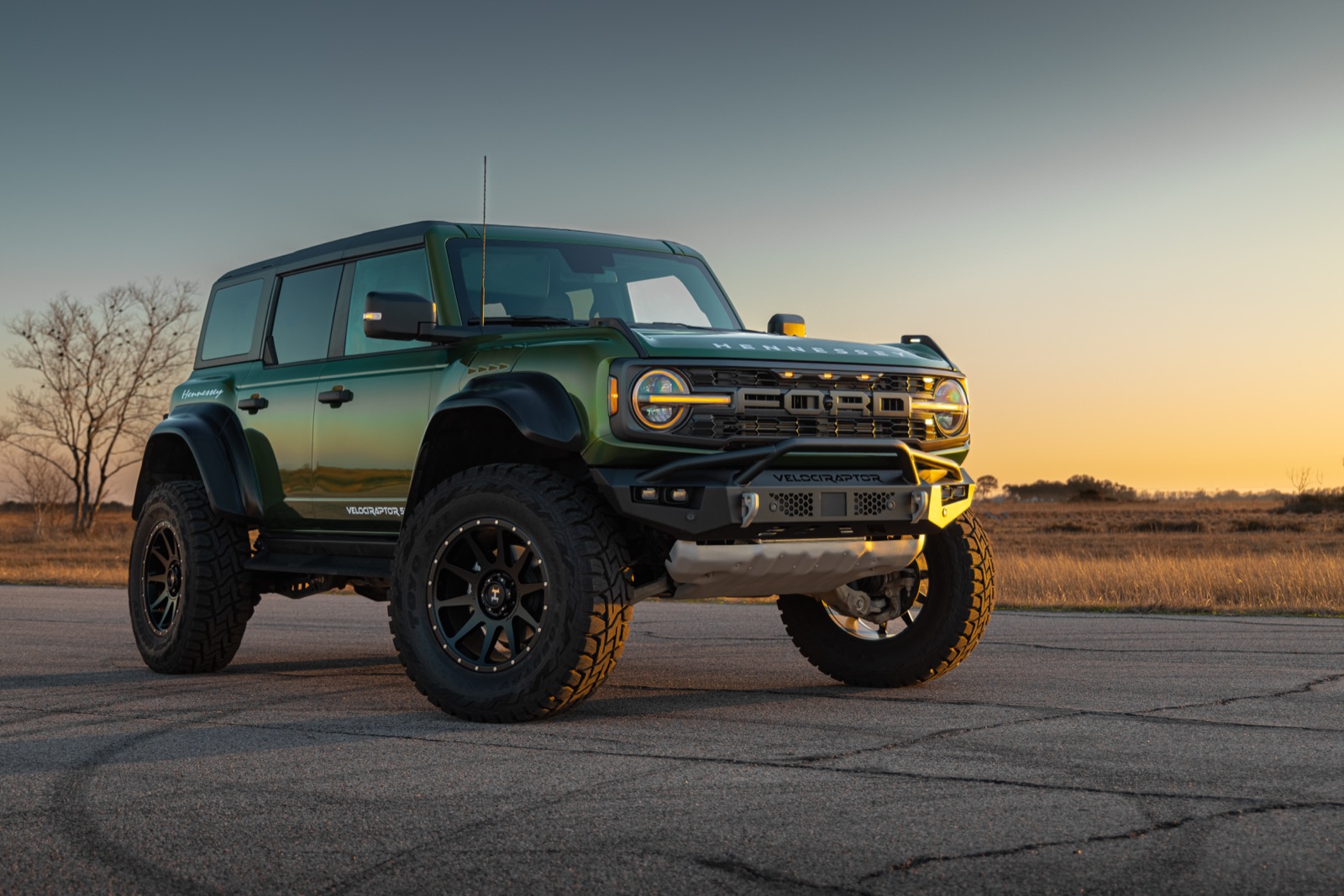 Green Hennessey Bronco VelociRaptor 500 Ford Bronco Raptor at dusk