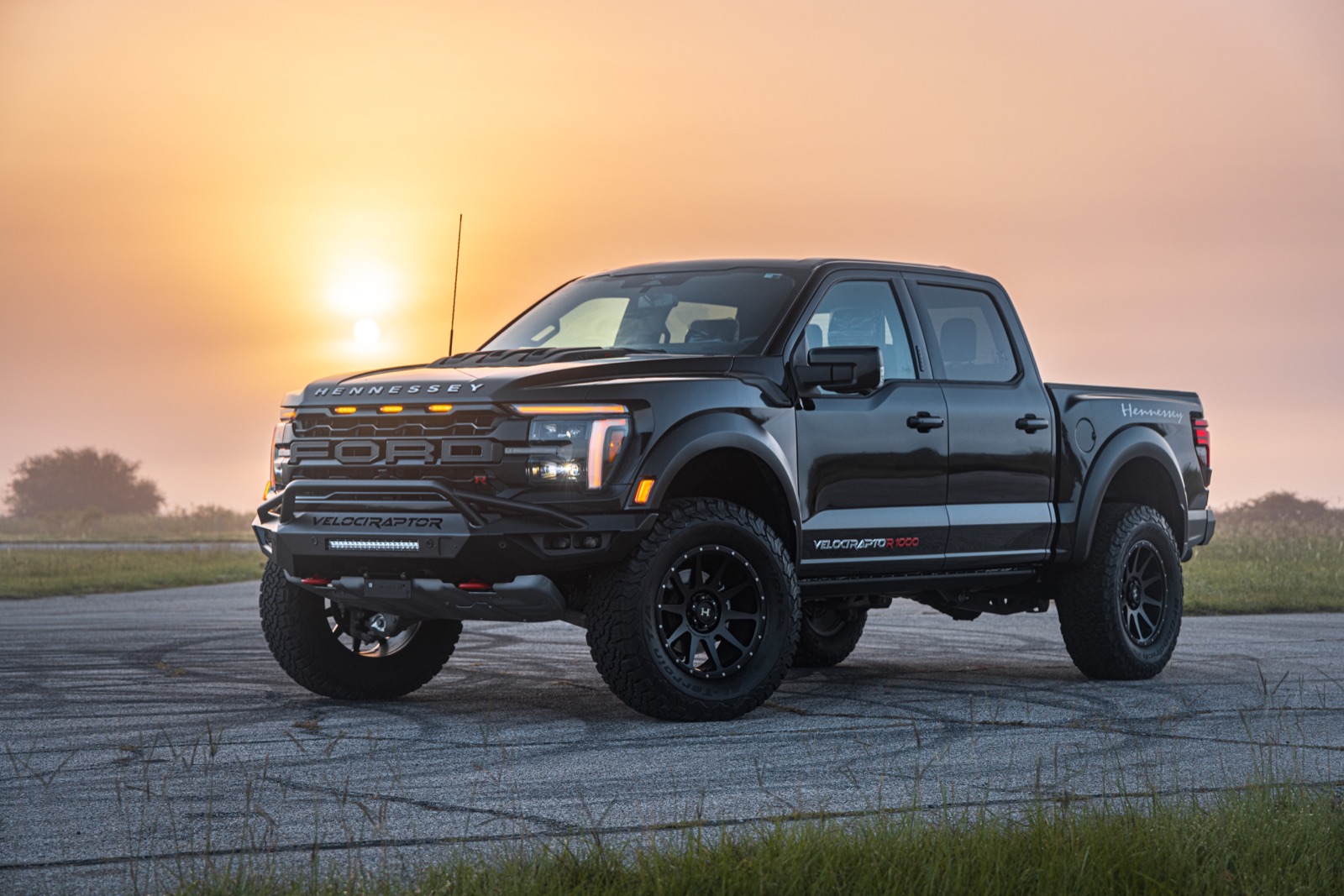 Black Hennessey VelociRaptoR 1000 Ford F-150 Raptor R at sunset