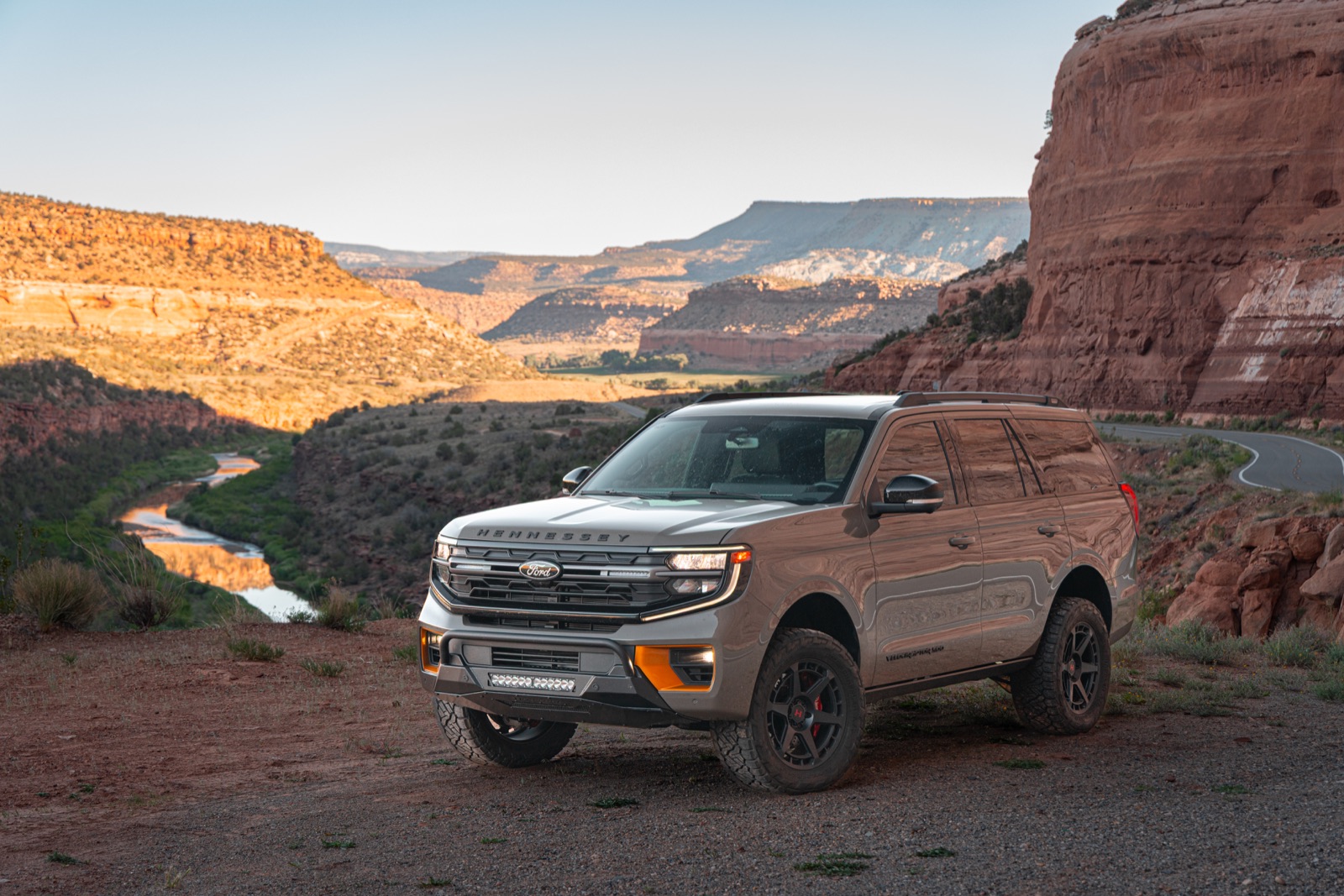 Hennessey VelociRaptor SUV Ford Expedition Tremor above a canyon river