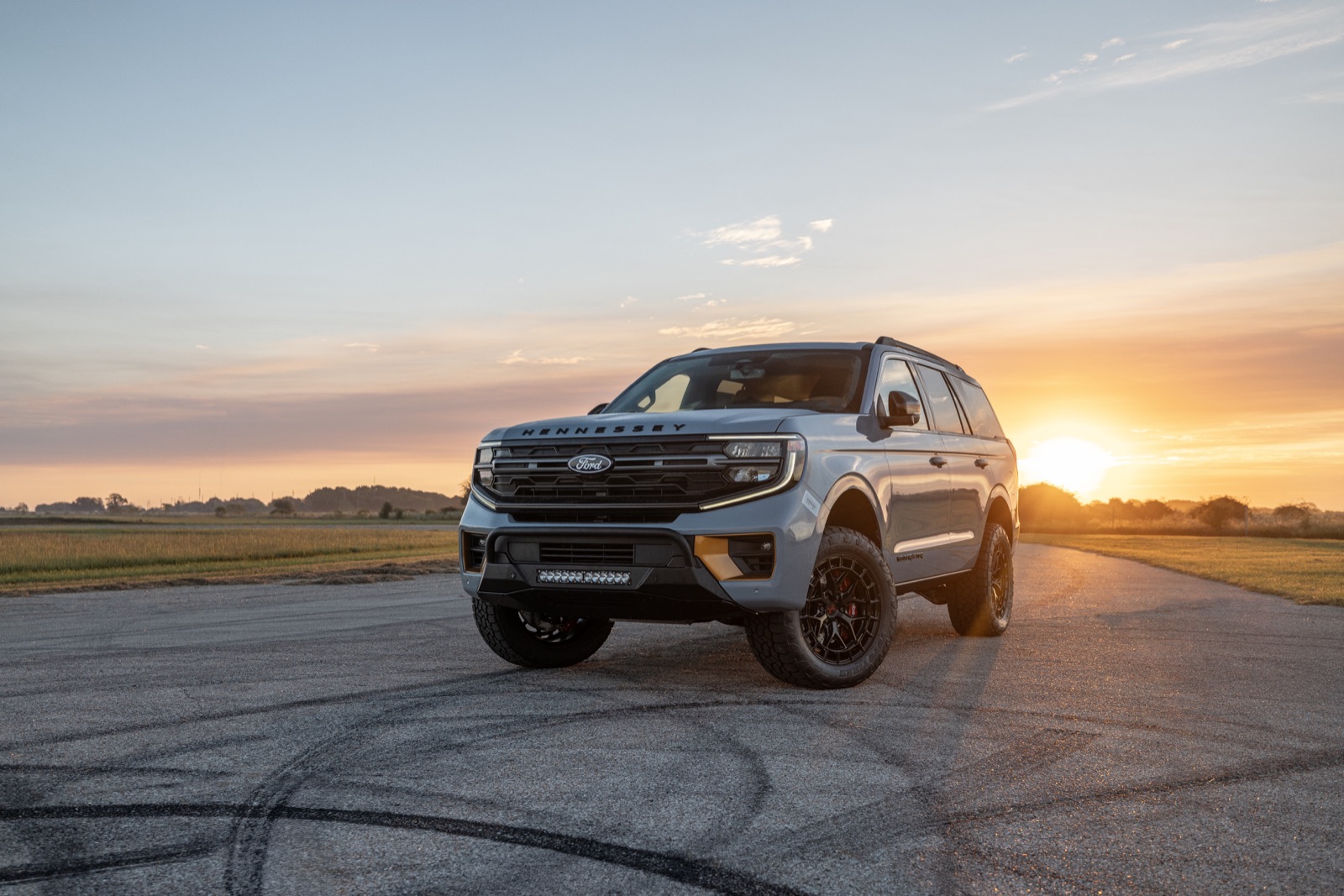Silver Hennessey VelociRaptor SUV Ford Expedition at sunset, for San Antonio buyers
