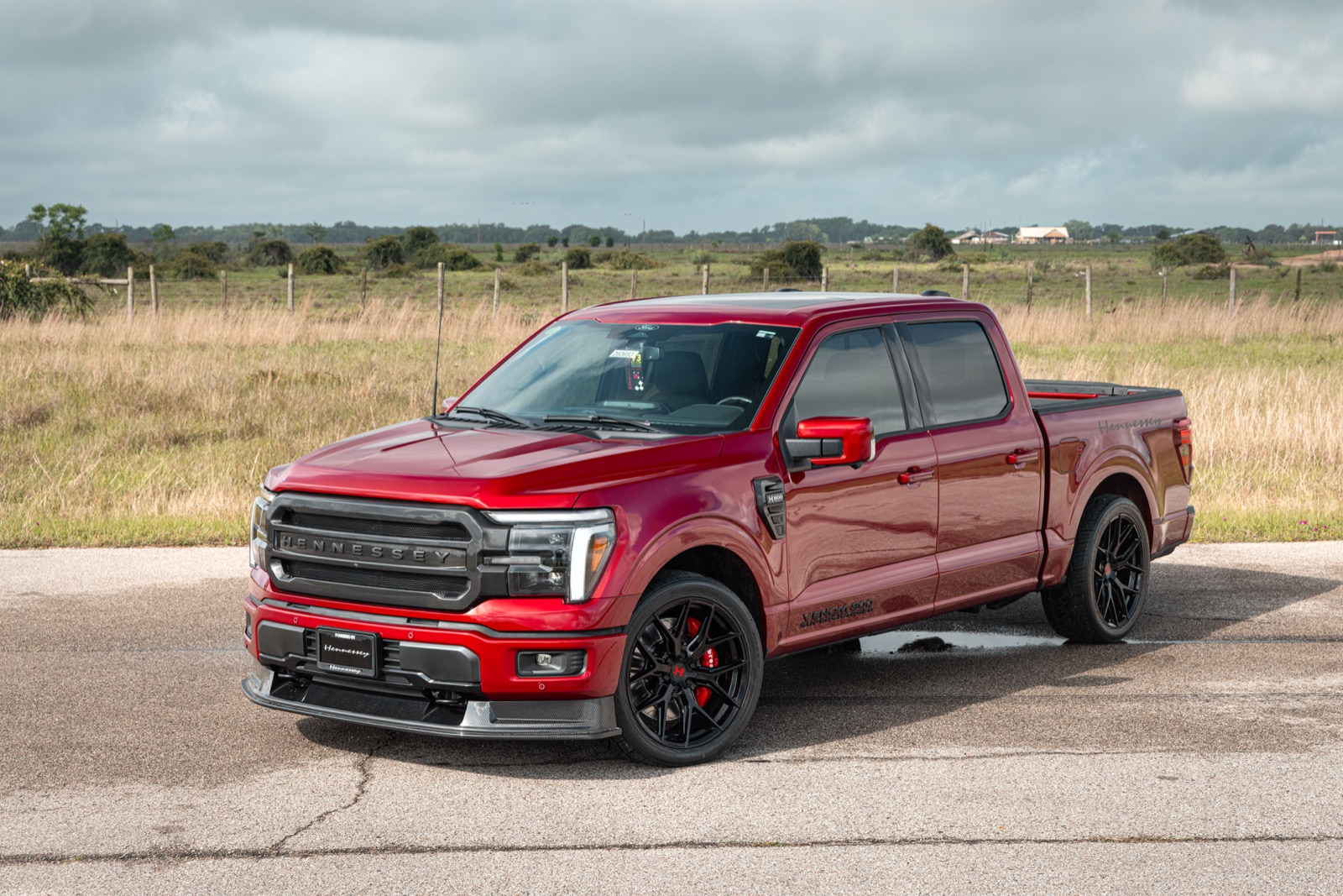 Red Hennessey Venom 800 lowered Ford F-150 crew cab sport truck